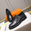 Louis Vuitton black leather lace-up derby shoes.