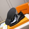 Louis Vuitton black leather lace-up derby shoes.