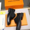 Louis Vuitton black leather lace-up derby shoes.