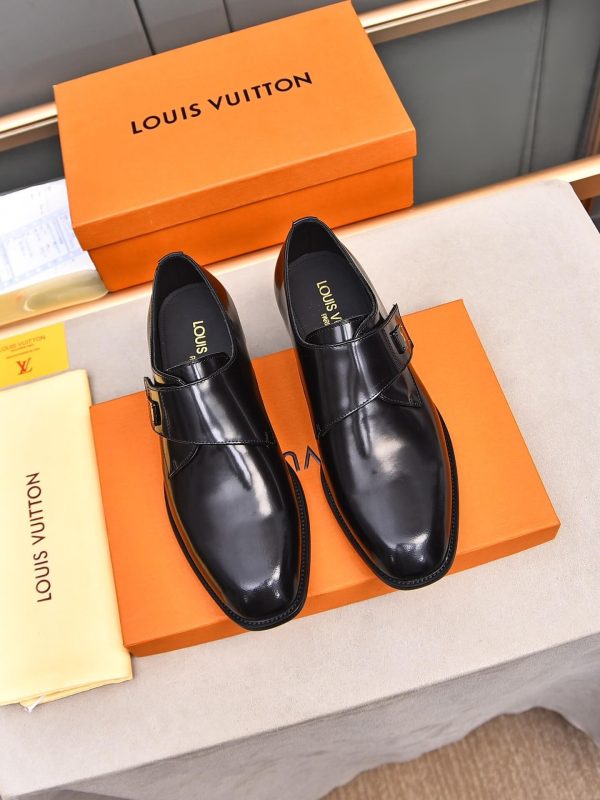 Louis Vuitton black leather monk shoes.