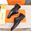 Louis Vuitton black leather monk shoes.