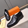 Louis Vuitton black leather monk shoes.