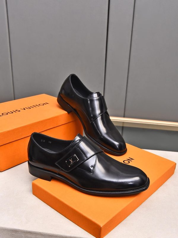 Louis Vuitton black leather monk shoes.