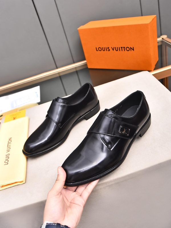 Louis Vuitton black leather monk shoes.