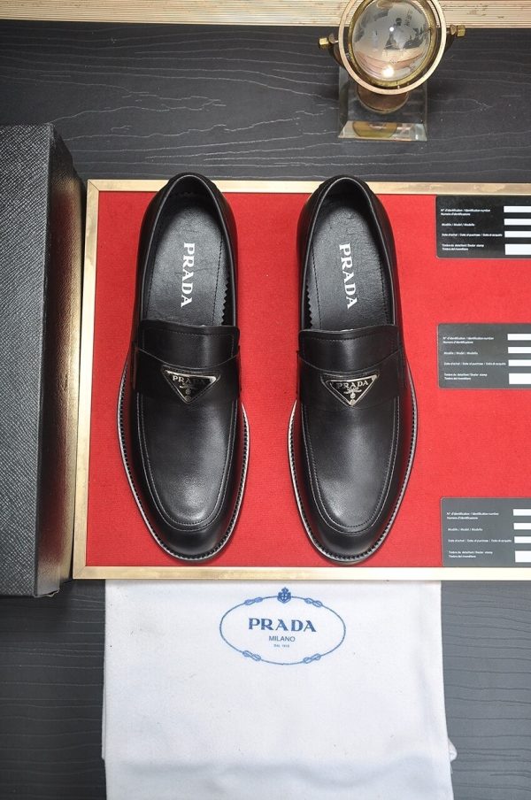 Prada Chocolate brushed leather loafers.