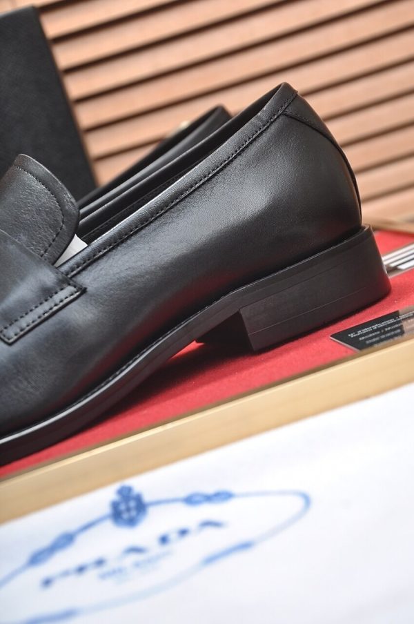 Prada Chocolate brushed leather loafers.