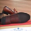 Prada Chocolate brushed leather loafers.
