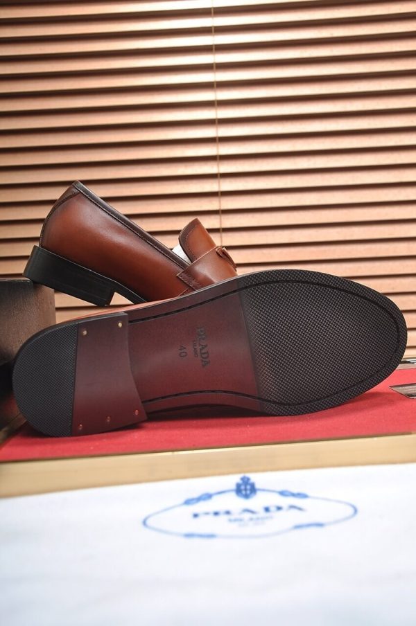 Prada Chocolate brushed leather loafers.