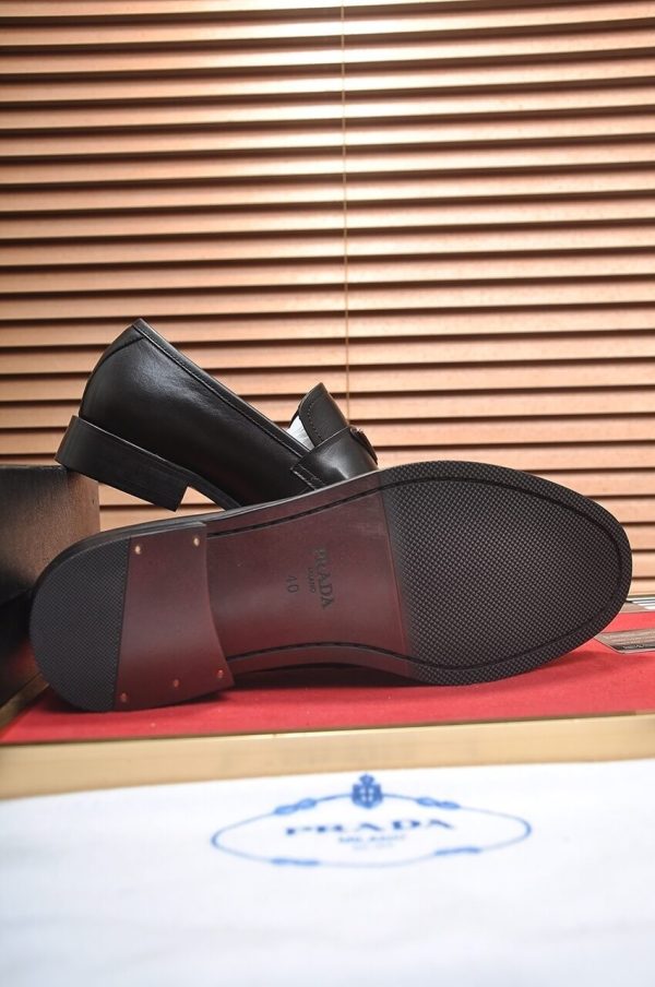 Prada Chocolate brushed leather loafers.