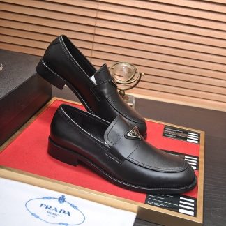 Prada Chocolate brushed leather loafers.