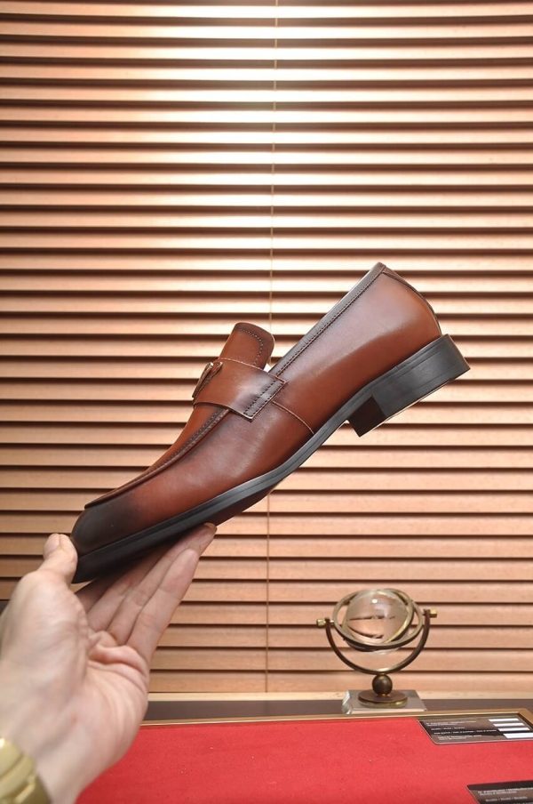 Prada Chocolate brushed leather loafers.