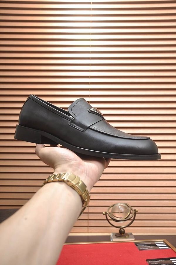 Prada Chocolate brushed leather loafers.
