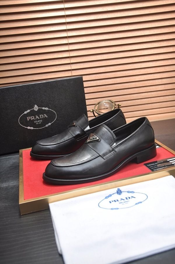 Prada Chocolate brushed leather loafers.