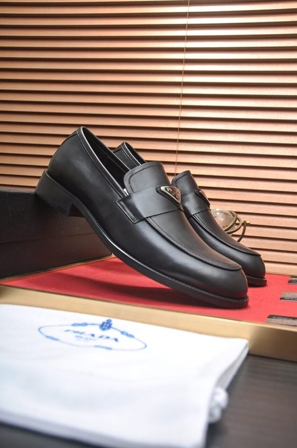 Prada Chocolate brushed leather loafers.