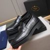 Prada black brushed leather loafers.