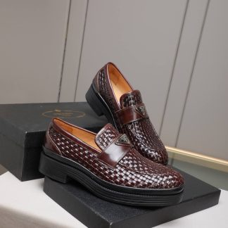 Prada woven leather loafers.