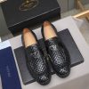 Prada woven leather loafers.