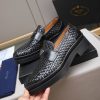 Prada woven leather loafers.