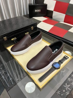 BOSS brown leather slip-on sneakers.
