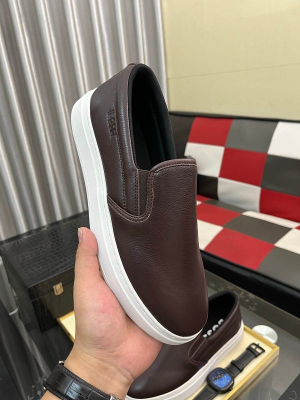 BOSS brown leather slip-on sneakers.