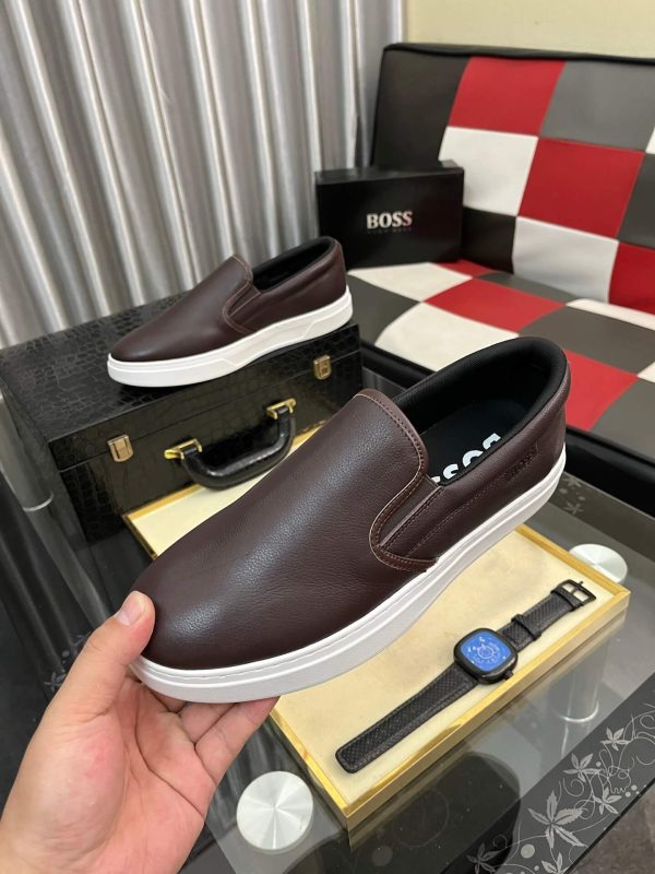 BOSS brown leather slip-on sneakers.
