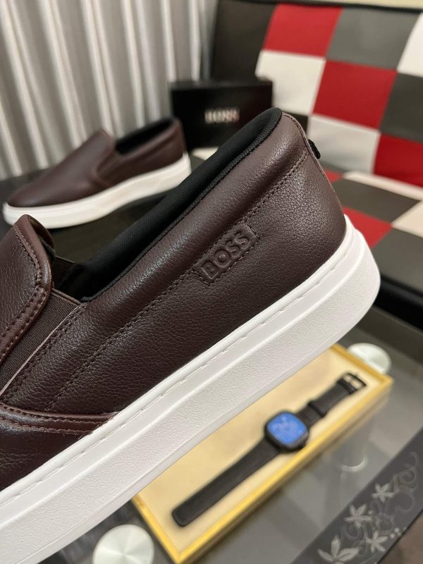 BOSS brown leather slip-on sneakers.