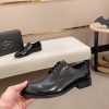 black Prada leather derby dress shoes.