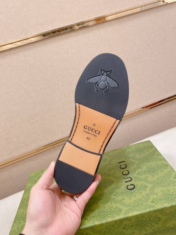 Gucci brown leather penny loafers