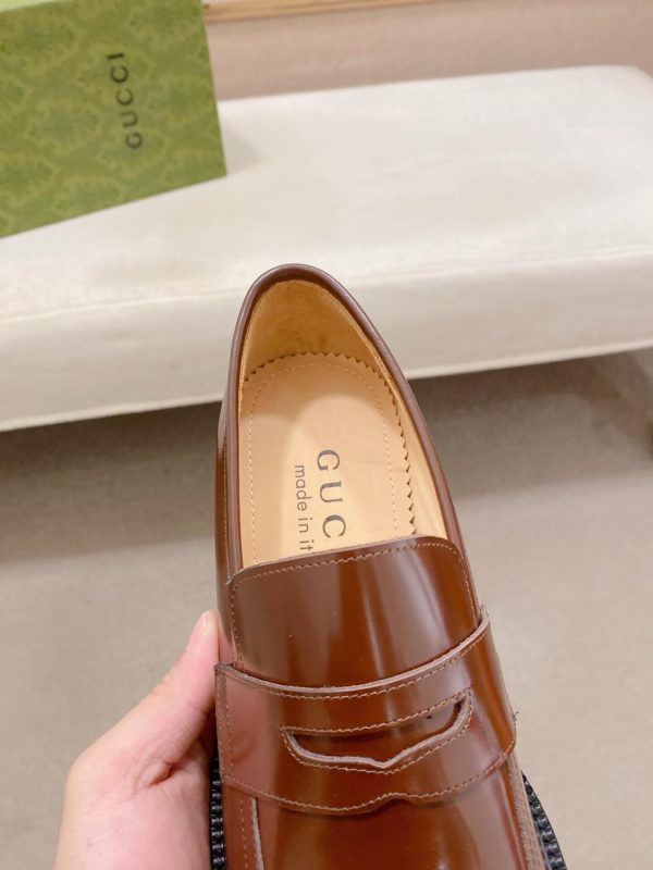 Gucci brown leather penny loafers