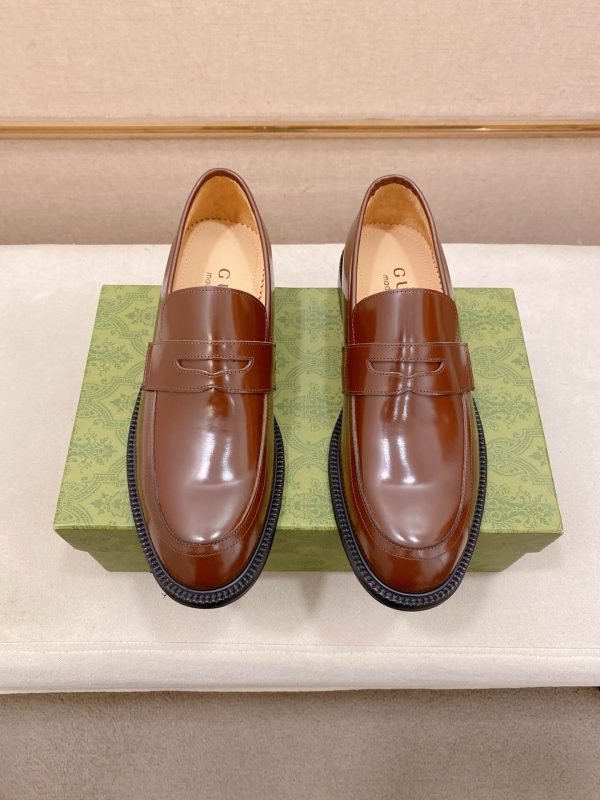 Gucci brown leather penny loafers