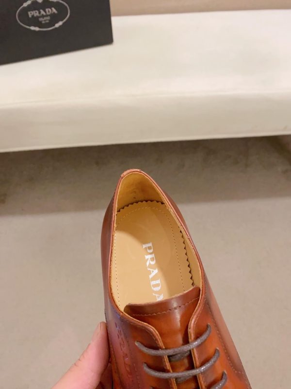 brown men's formal derby shoes.