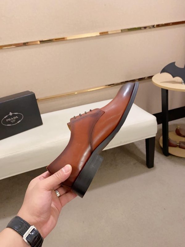 brown men's formal derby shoes.