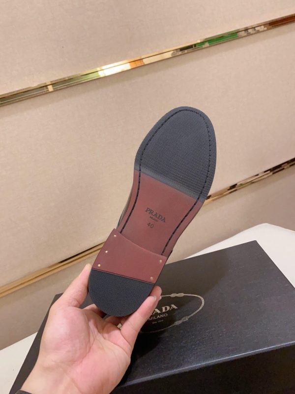 Brown men's formal derby shoes.