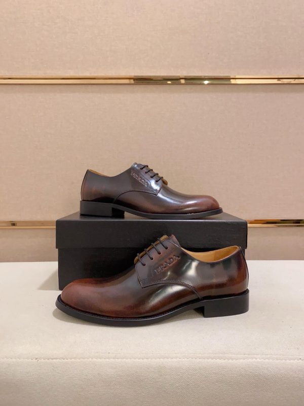 Brown men's formal derby shoes.