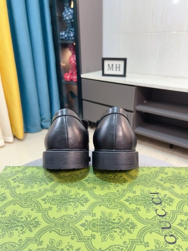 Black leather Gucci loafer