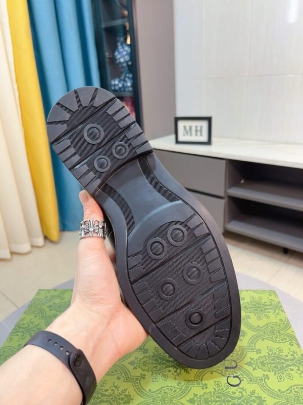 Black leather Gucci loafer