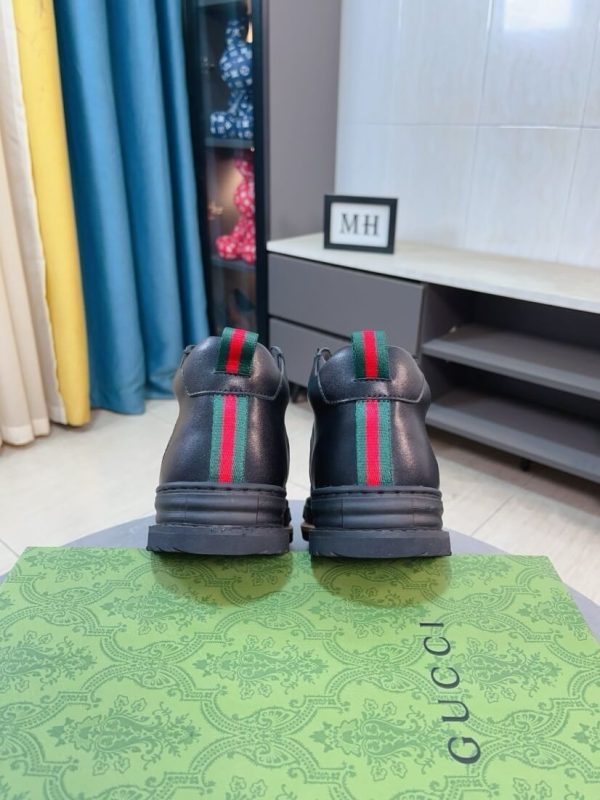 Gucci GG canvas and black leather high-top sneakers