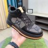 Gucci GG canvas and black leather high-top sneakers