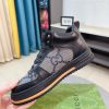 Gucci GG canvas and black leather high-top sneakers