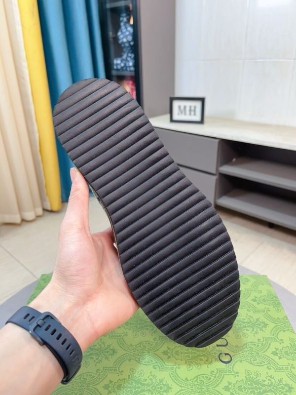 Gucci GG canvas and black leather high-top sneakers