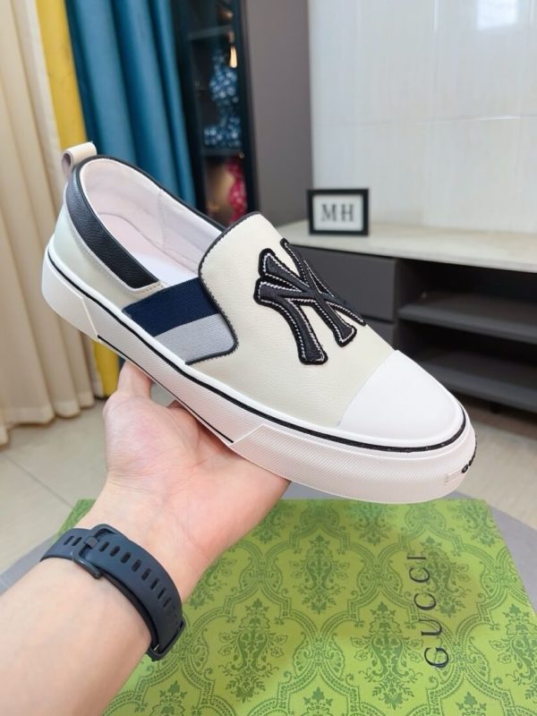 Gucci Slip-On sneakers in black and white (1) Gucci Slip-On sneakers in black and white.