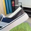 Gucci Slip-On sneakers in black and white (4) Gucci Slip-On sneakers in black and white.