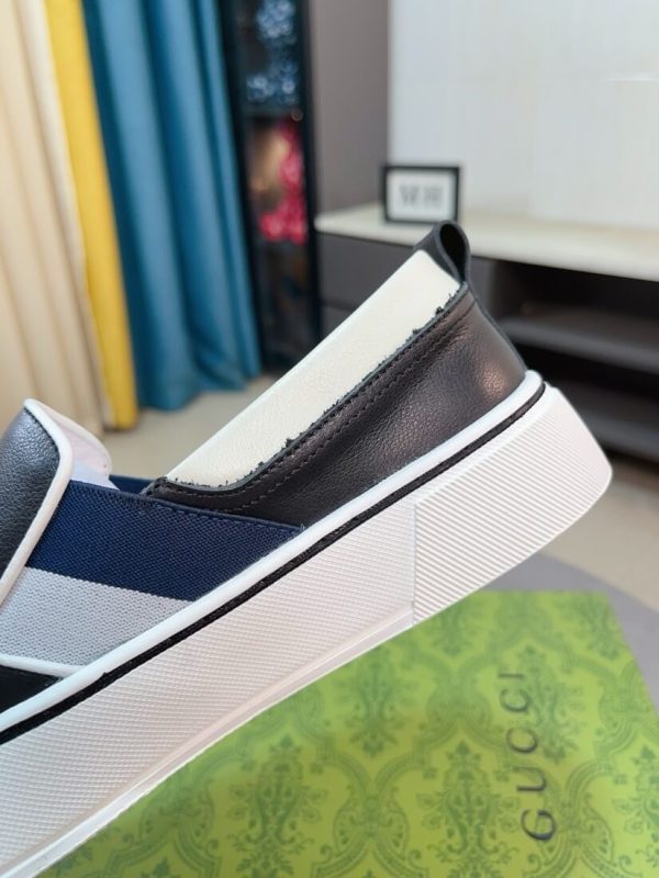 Gucci Slip-On sneakers in black and white (4) Gucci Slip-On sneakers in black and white.