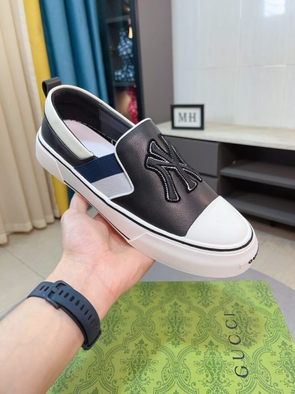 Gucci Slip-On sneakers in black and white (8) Gucci Slip-On sneakers in black and white.