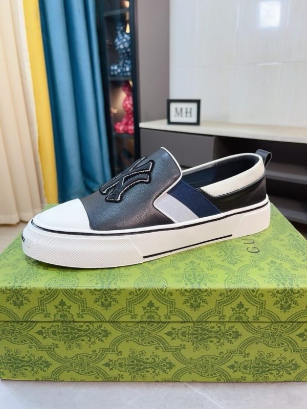 Gucci Slip-On sneakers in black and white (9) Gucci Slip-On sneakers in black and white.