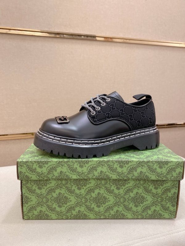 _Gucci black leather canvas derby shoes. (1) Gucci black leather canvas derby shoes.