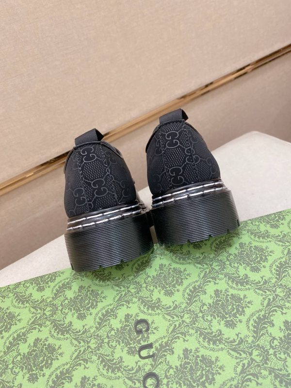 _Gucci black leather canvas derby shoes. (3) Gucci black leather canvas derby shoes.