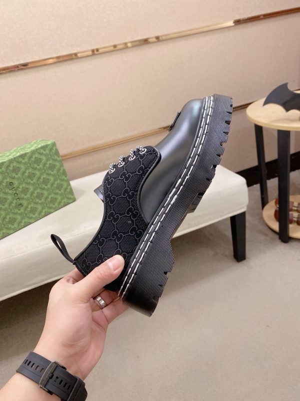 _Gucci black leather canvas derby shoes. (6) Gucci black leather canvas derby shoes.