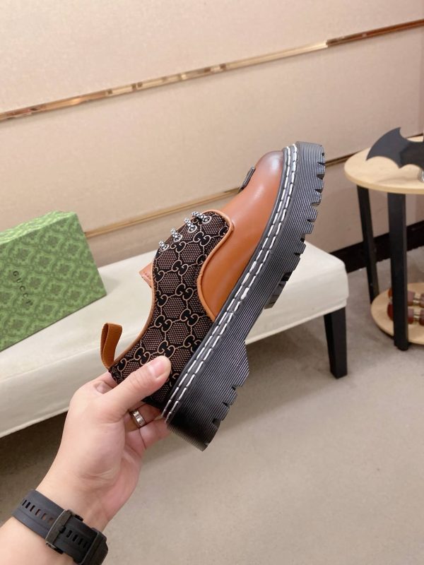 Gucci leather canvas platform derby shoes. (6) Gucci leather canvas platform derby shoes.