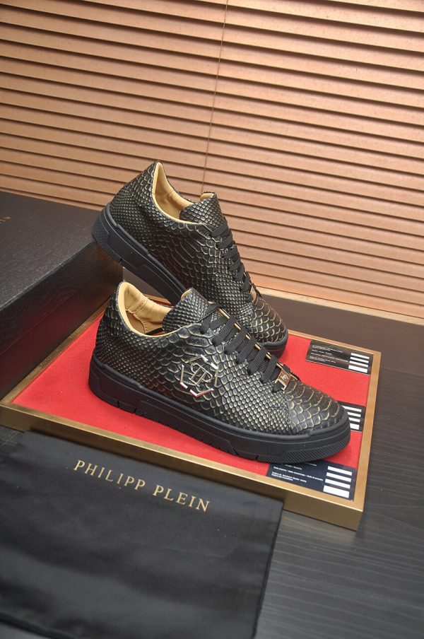 Philipp Plein black real python leather lo-top sneakers.